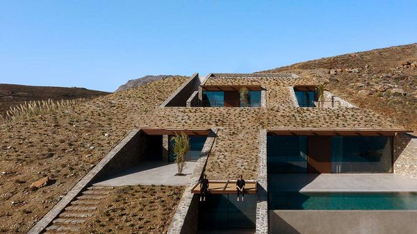 Dream house carved into a windswept hillside overlooking the Aegean Sea