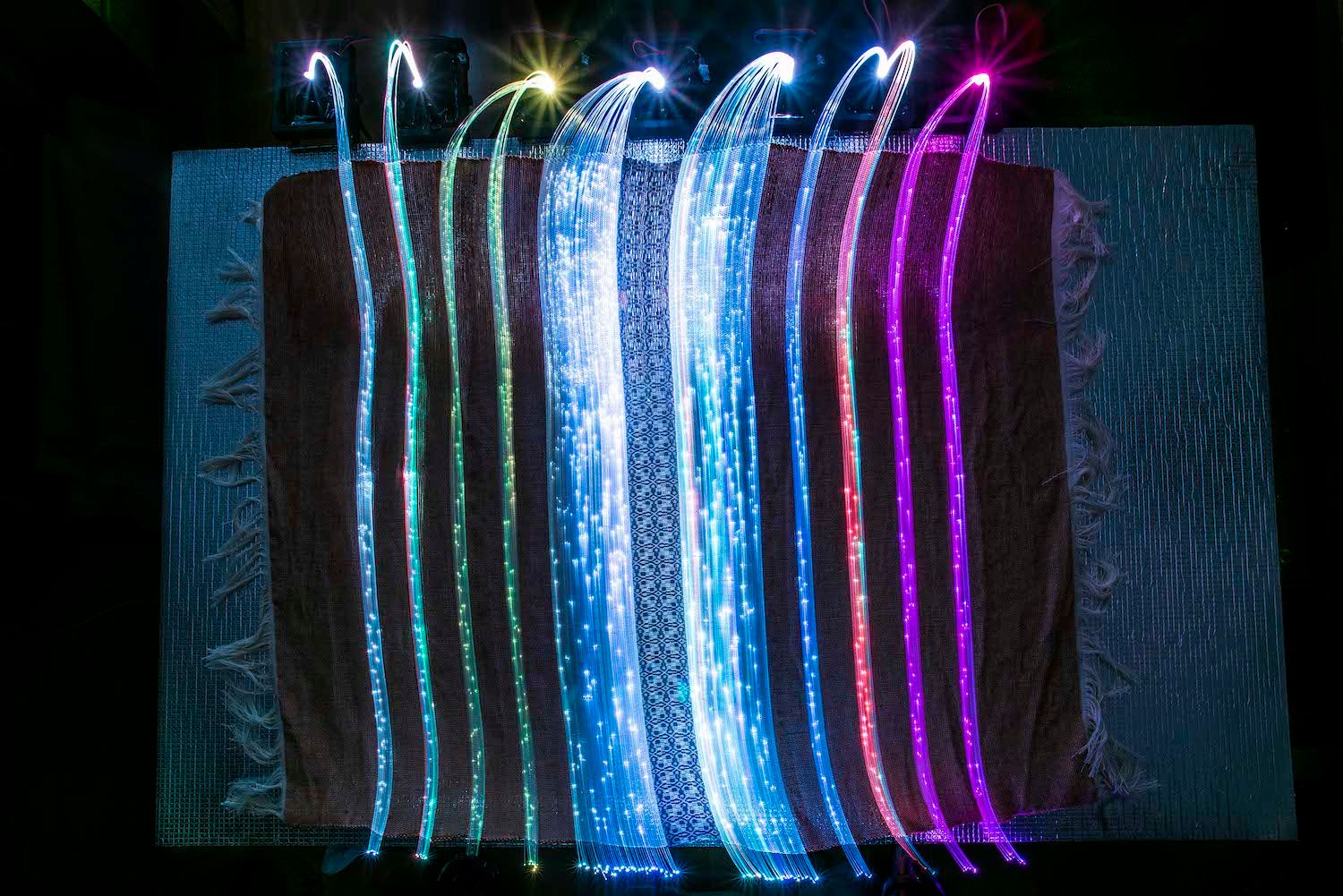 Textile of night lights woven with optical fibers | MetropoLight