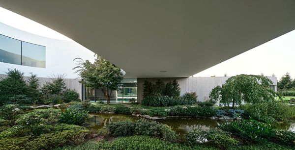 Robert Konieczny creates harmony with a house designed around a garden