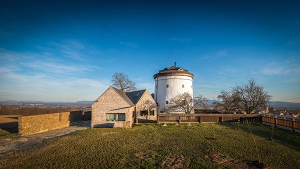 This is how a minimalist family house was built from a historic windmill!