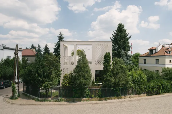 Terrace house with a perforated brick façade | MFRMGR Architekci