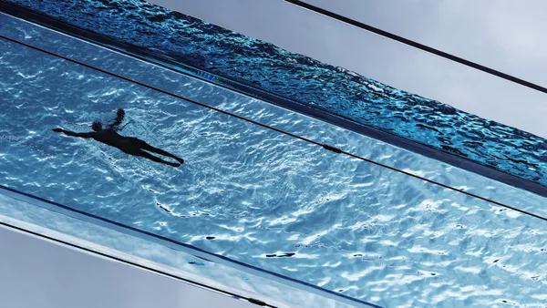 Fully transparent swimming pool bridge built in London | HAL architects